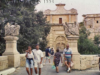 [Photo of Lewis at the Mdina Gate]